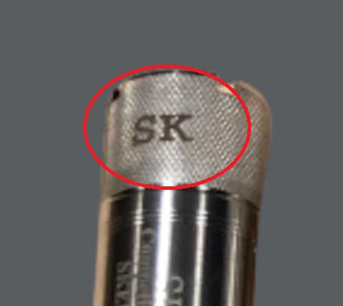 a choke tube with SK written on it that means Skeet Choke size
