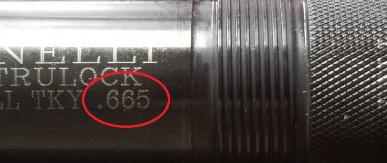 a 665 diameter turkey choke tube with the numbers 665 written on it